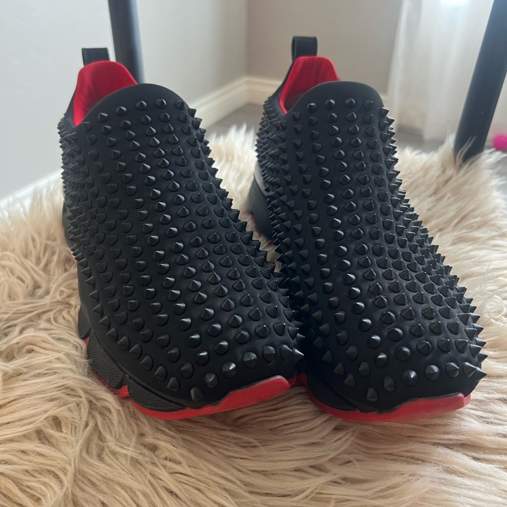 Christian Louboutin Black and Red Studded Sneakers